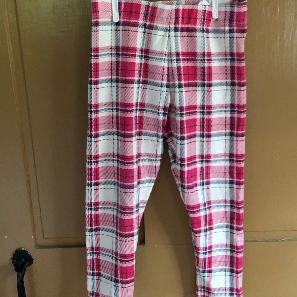 Little girl fleece lined plaid leggings.